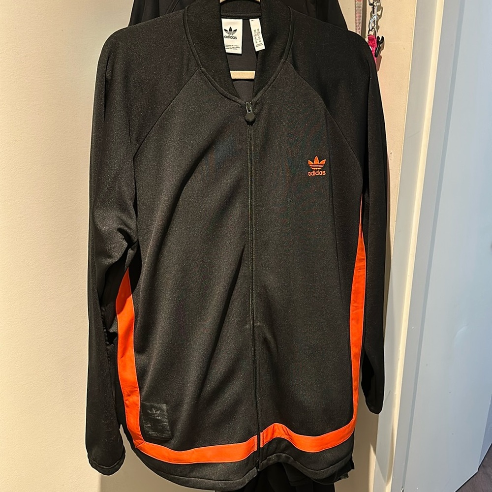 Rare, amazing Adidas track suit jacket with orange trim. 50th anniversary